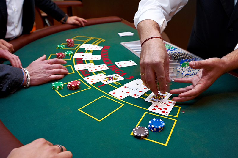 blackjack dealer showing cards